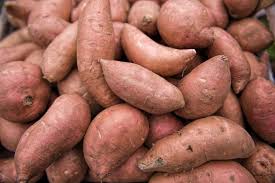 A bunch of Red Sweet Potatoes.